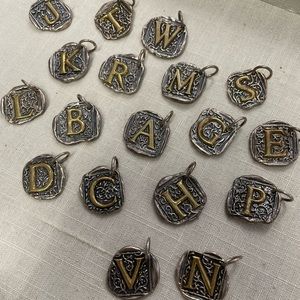 Waxing Poetic Charms. Initials.